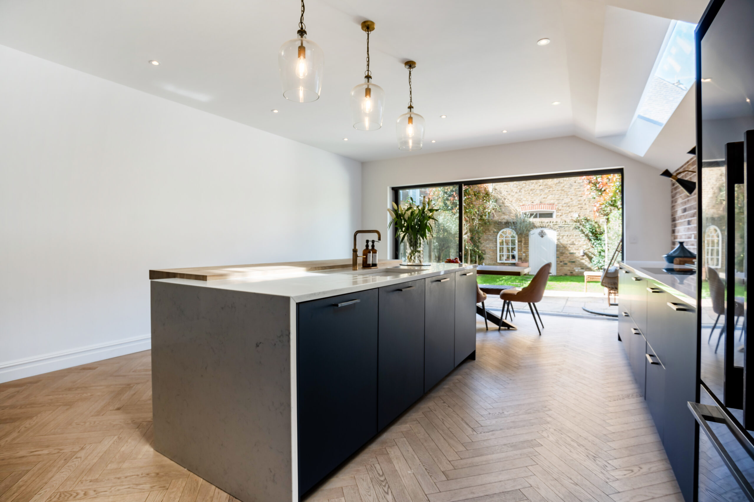 kitchen island with statement lighting